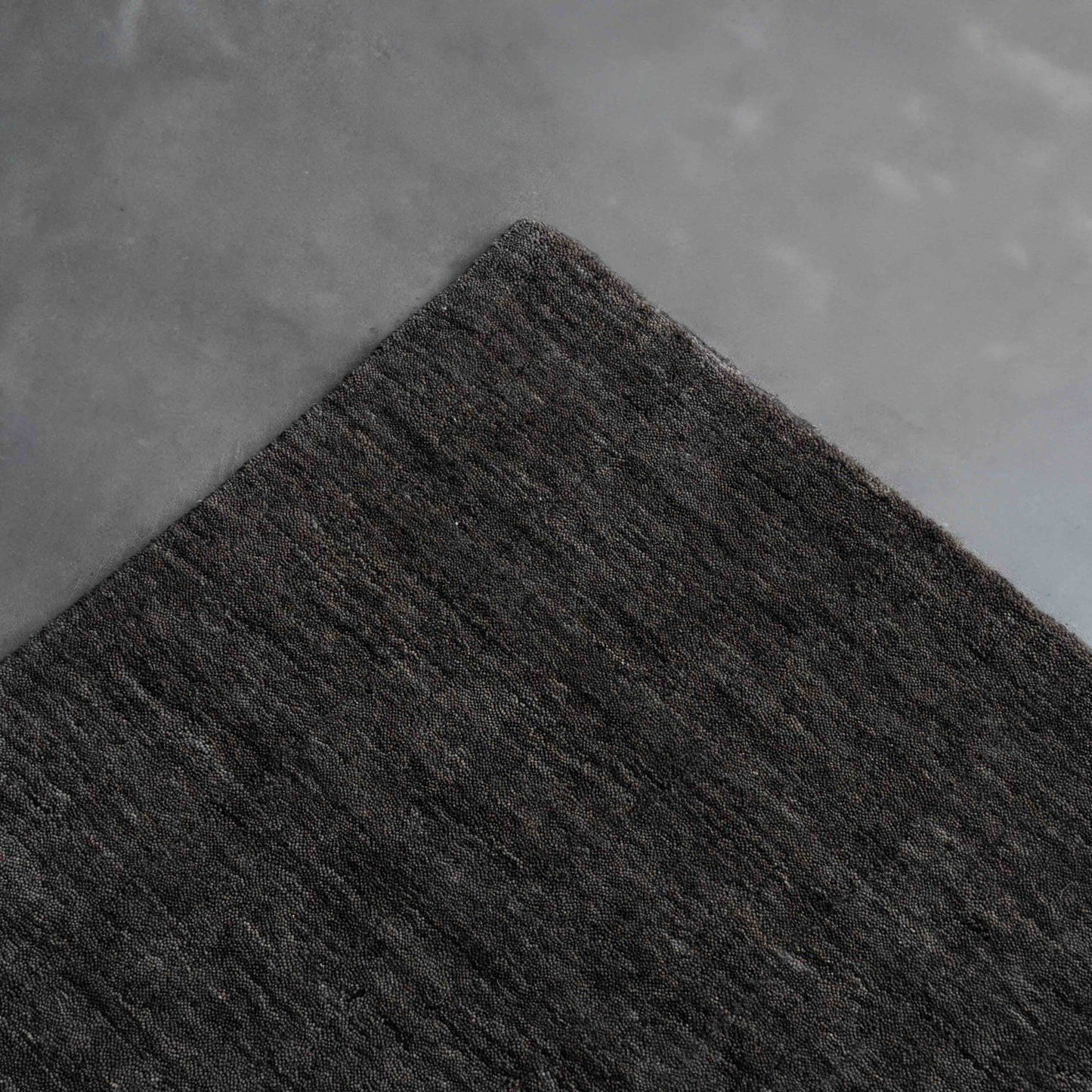 Aviral Handcrafted Black and Grey Wool Soft Rug